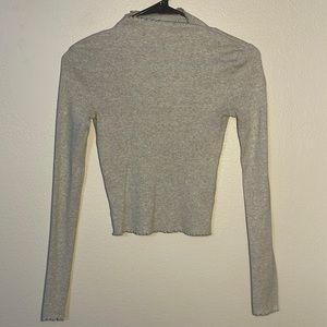Grey long sleeve woman’s shirt
